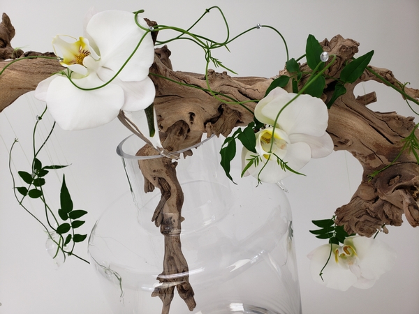 Phalaenopsis orchid and driftwood floral art design
