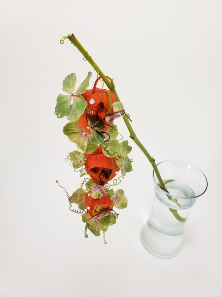 Physalis and hydrangeas in an autumn floral design