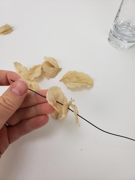 Thread faded foliage into a wire