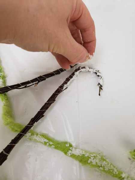 Add a bit of artificial snow to the candy cane