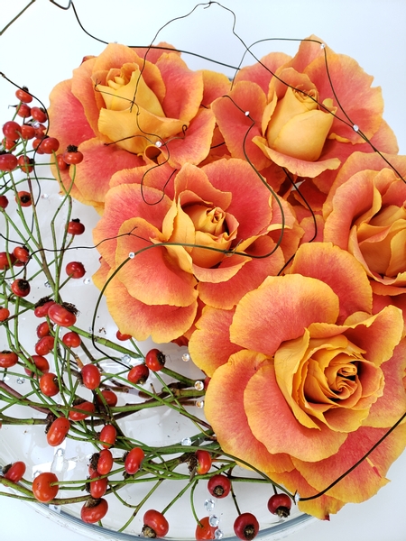 Bright autumn roses floral design for the days after Halloween