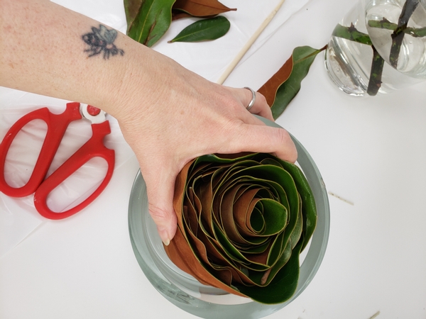 Slip the leaf roll into a display vase