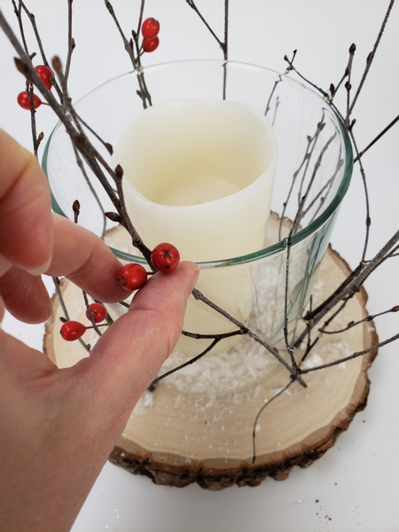 And glue the berries to the twigs