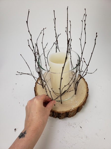 Creating a lantern of twigs for the light to shine through