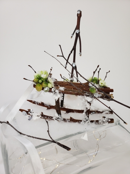 Easy to craft twig sleigh for Christmas styling