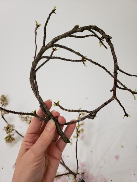 Curl a twig into a circle