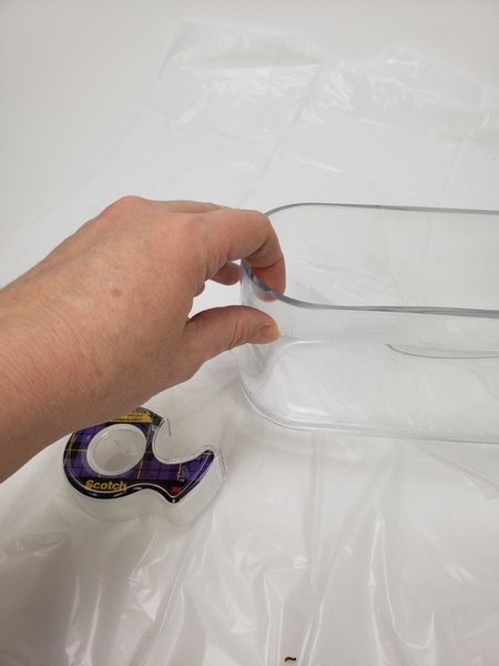 Secure a thin strip of tape around the exposed side to protect the container