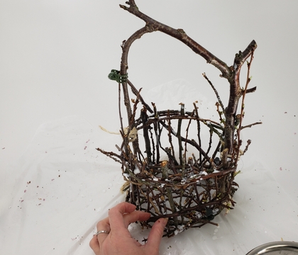 Glue an early Spring basket from leftover cherry blossom twigs