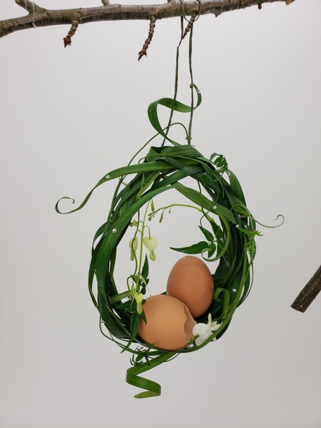Egg shape interwoven grass wreath for easter eggs
