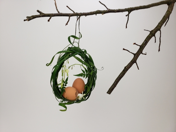 Hang an egg shaped wreath for sustainable and zero waste floral Easter styling