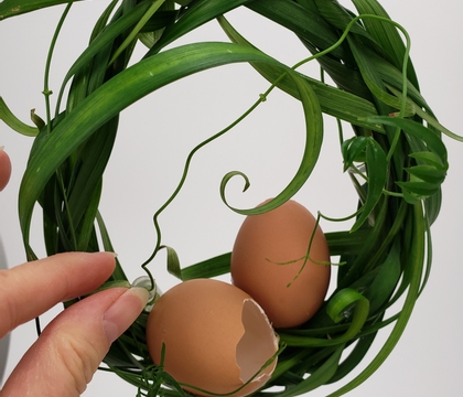 Interweave a dangling Egg outline Easter Wreath Basket