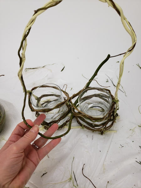 Weave in willow stems over the handle and around the figure eights
