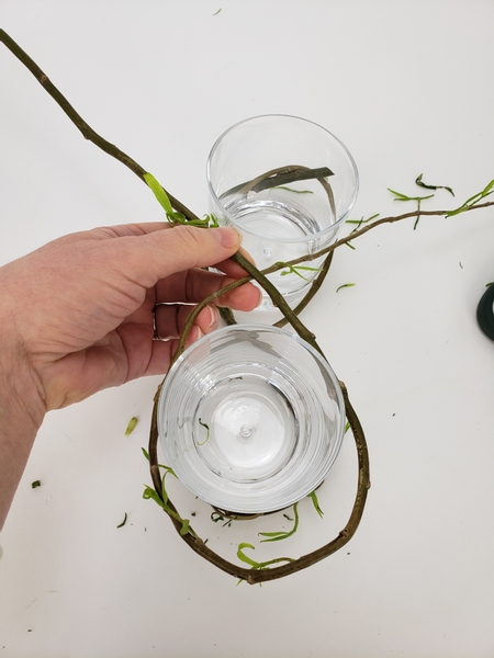 Wrap a second weaving willow stem around the first glass