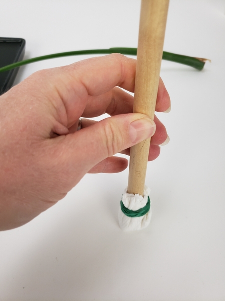 Stamp the covered dowel on your working surface to make sure it is well padded