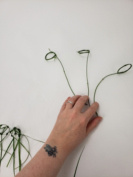 Each net-wreath sits slightly different on the vine