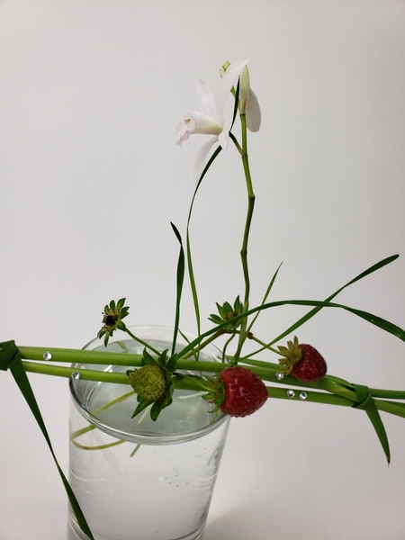 Adding strawberries to your summer floral arrangement