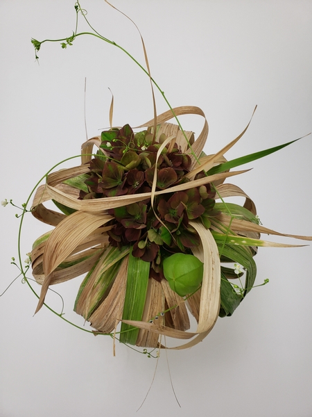 Hydrangea in a foliage collar for autumn styling