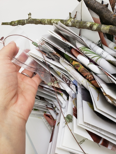 Slip the zip lock bag between the pages