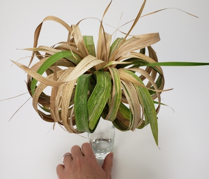 Turn some gladiolus leaves into a pumpkin vase collar