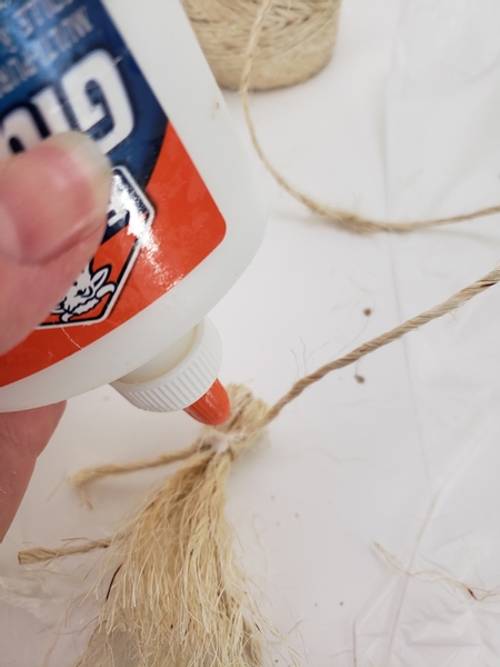And place a small drop of wood glue on the knot to keep it secure