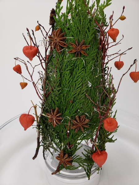 Chinese lantern and aniseed Christmas floral design