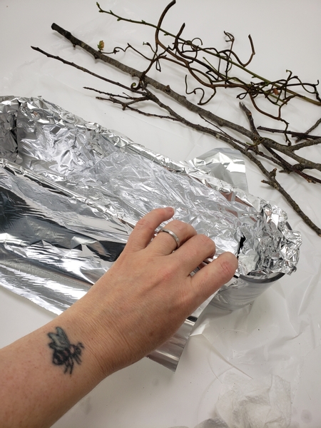 Line your display container with foil
