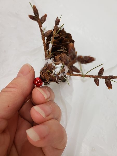Glue on Rudolph's very shiny red nosed reindeer and sprinkle on some artificial snow