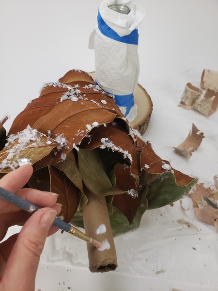 Paint the cardboard tube with wood glue