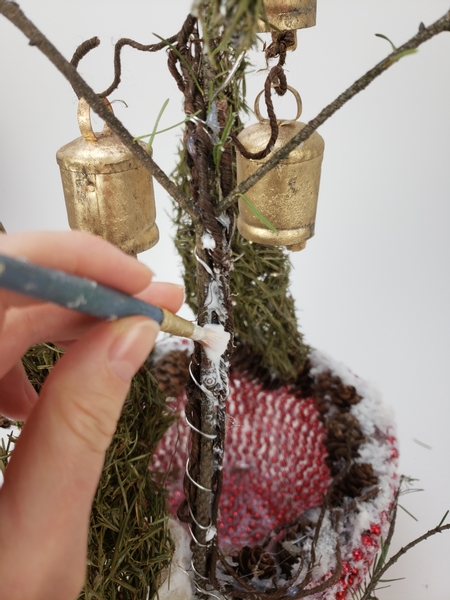 Paint the wired twig with wood glue