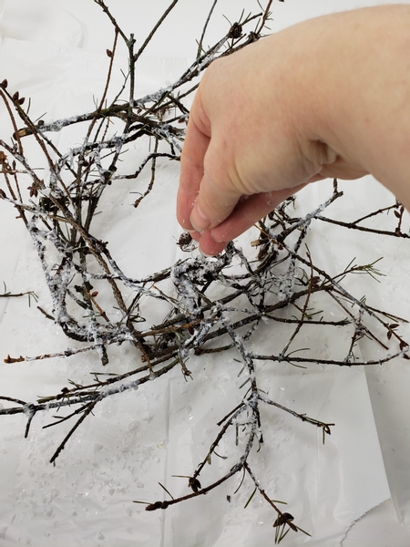 Scatter artificial snow all over the twig wreath