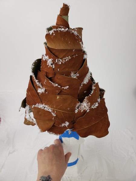 Set the tree aside for the glue and snow to dry