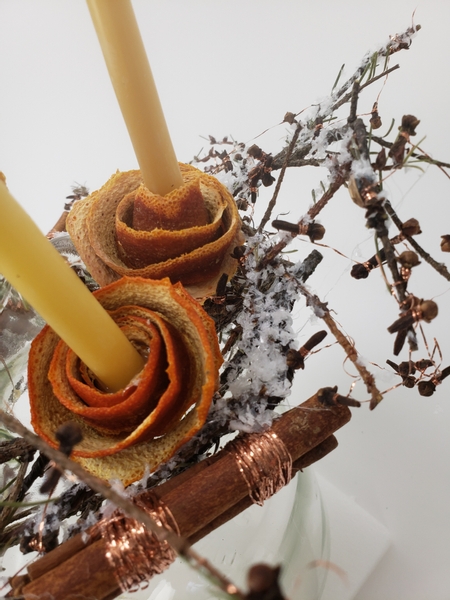 Spiral orange peel to make roses for candles