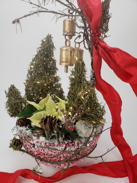 Tabletop garland bowl and reindeer Christmas floral design