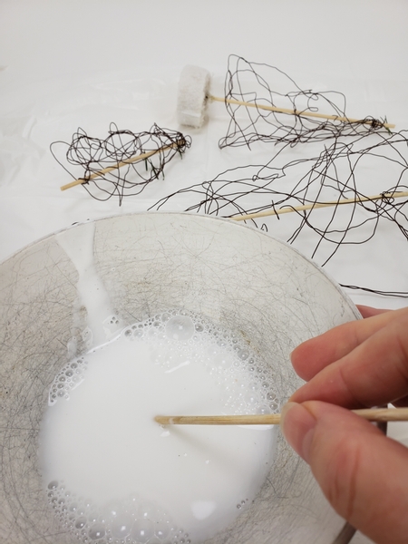 Thin some wood glue in an old bowl