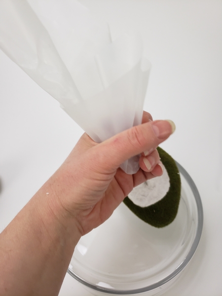 Gather a sheet of heavy duty lining plastic in your hand