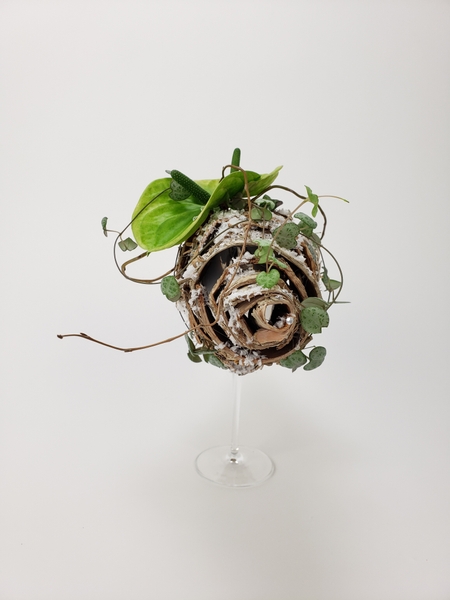 Manipulate birch bark into shapes for contemporary floral designs