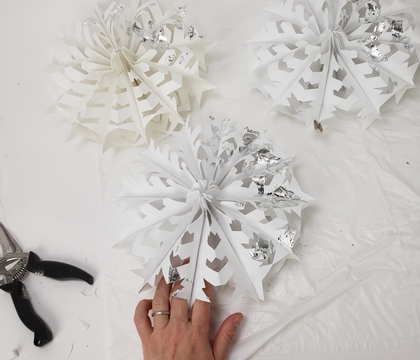 Silver leaf Paper Snowflakes to display your winter flowers on