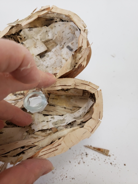 Glue the curved bark to the edge of the bark heart to finish it off