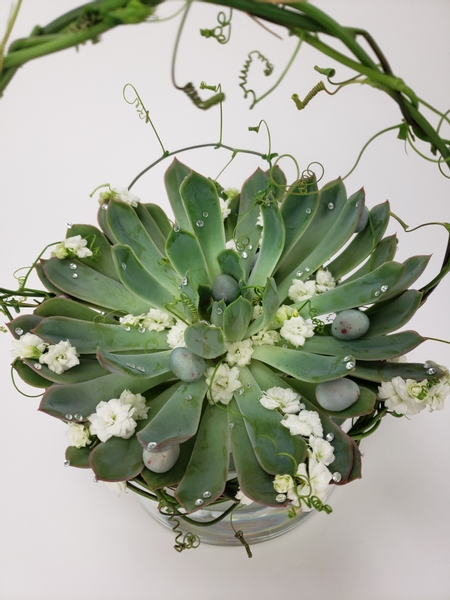 Hiding decorative Easter Eggs in a succulent nest display