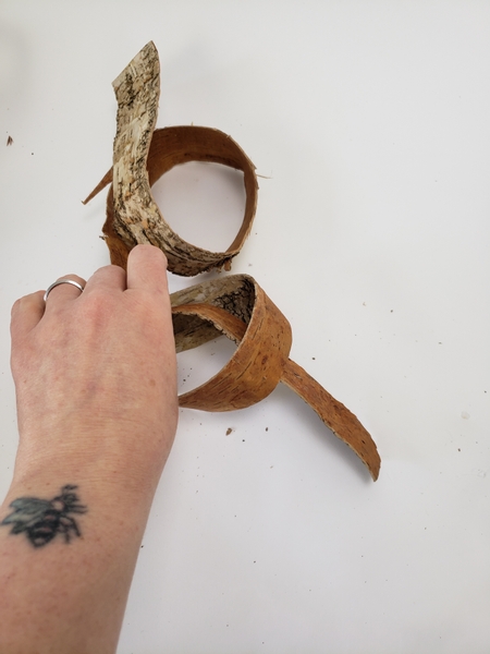 Untie the birch bark knots once dry
