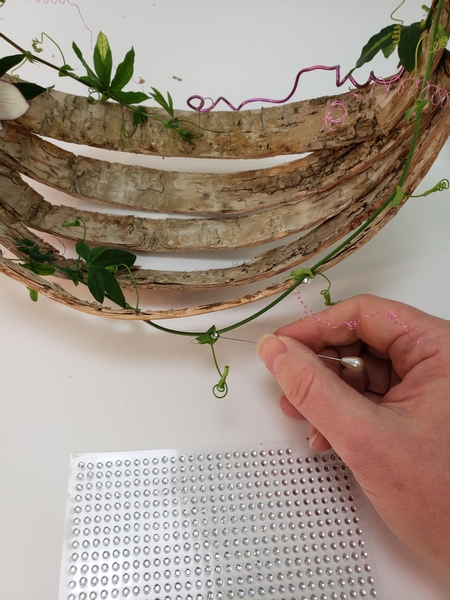 And finish the design with a few dew drop crystals all over the birch bark basket