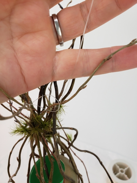 Hang the willow nest mobile using fishing line