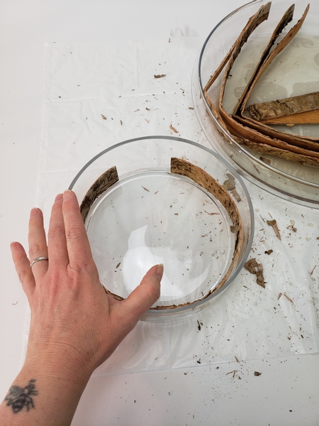 Place the soaked strips in a shallow bowl to dry into a curved shape