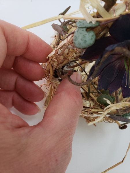 Slip your flowers into the water tube