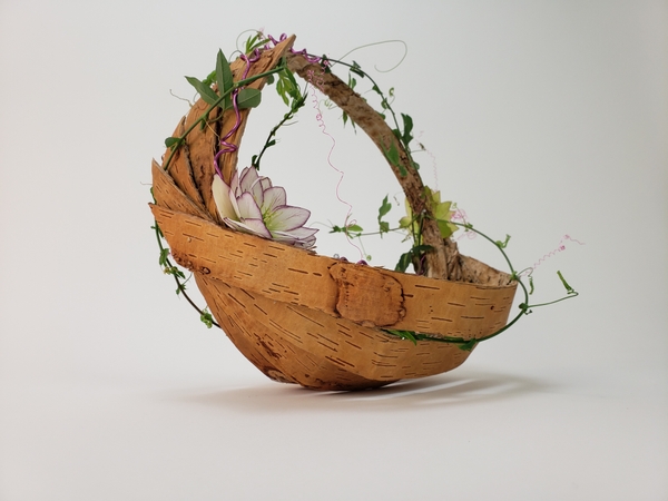 Sustainable and original spring floral design basket from bark