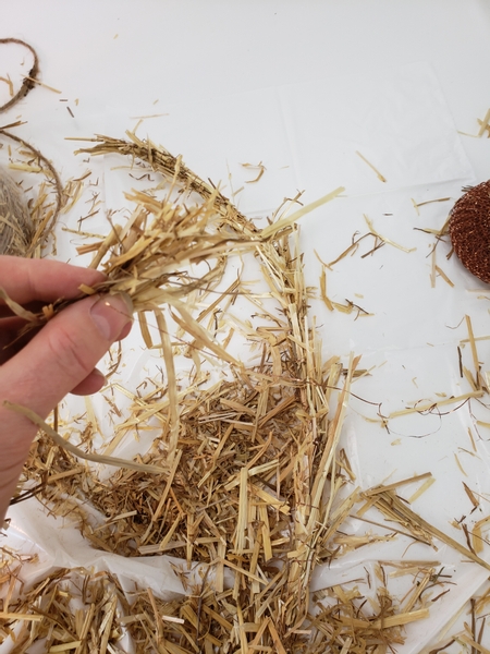 When you reach the end of the cane add the last pinch of straw to extend past the tip