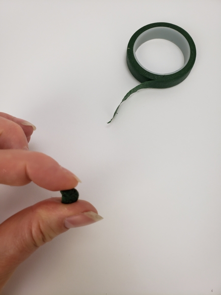 Roll a tiny tape ball