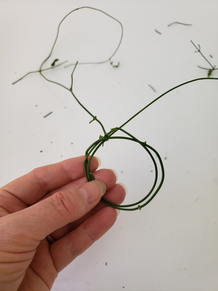 Start weaving a small vine wreath