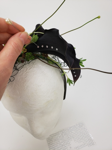 And dress the fascinator with a few rows of dew drop crystals