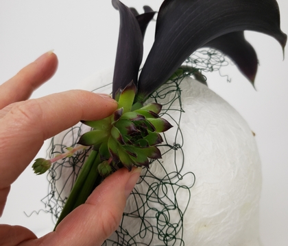 Cover a headband with a whole lot of little floral details for a contemporary fascinator